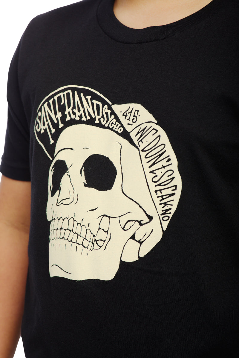 A person wearing the Youth Black Street Skull Tee, a chic black shirt showcasing the edgy Street Skull design and bold text. Made from 100% cotton, this tee offers both comfort and a fashionable appearance.