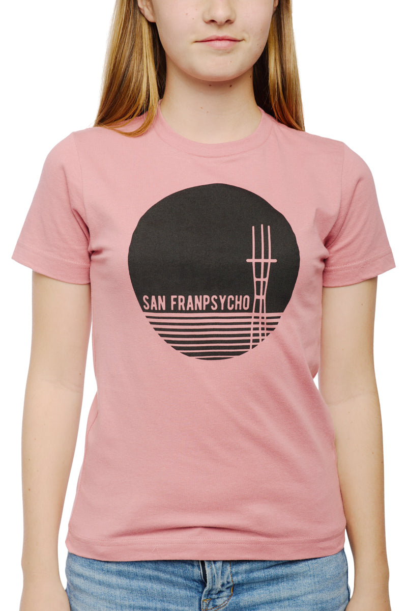 The Youth Sutro Tower Tee in pastel pink showcases a black circular graphic with bold SAN FRANPSYCHO text, made from 100% cotton for optimal comfort.