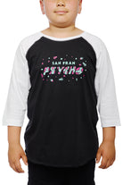 A child sports the Youth Planet Rock Baseball Tee, featuring a black and white design adorned with San Fran Psycho text and vibrant graphics, exuding classic 90s vibes.