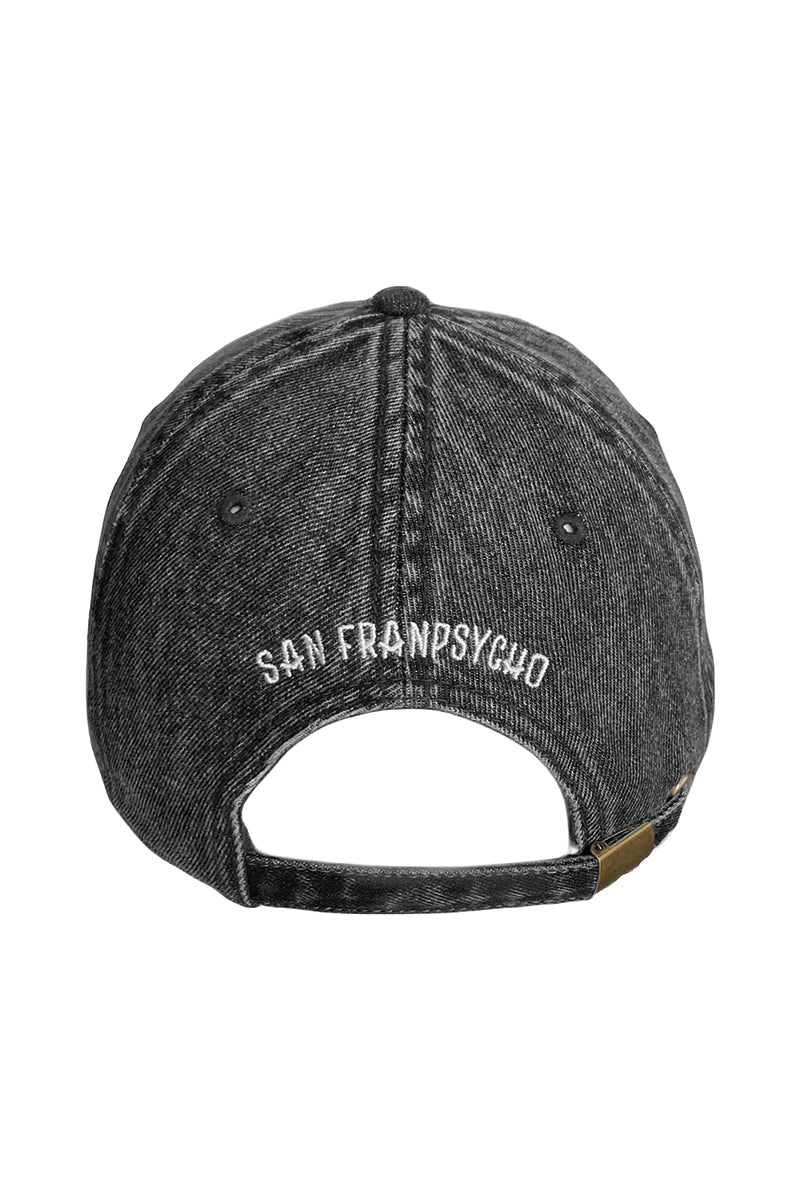 Back view of a Black Denim Peace Bones Dad Hat with San Franpsycho embroidered in white above the opening.