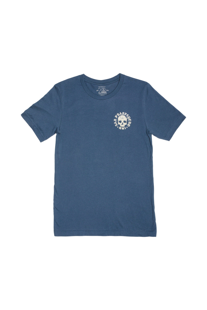 Explore the bold Punk Rock 2023 aesthetic with our BBNW Skull Tee. This blue shirt showcases a small skull and crossed bones logo on the front left side, perfect for adding an edgy touch to your style.