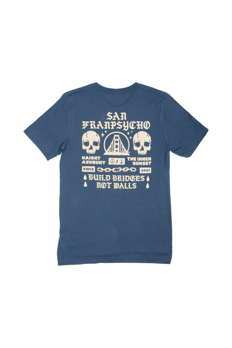 The BBNW Skull Tee is hand-printed with a blue skull and San Franpsycho text, showcasing a bold "Build Bridges Not Walls" message on the back. Ideal for capturing Punk Rock 2023 vibes.