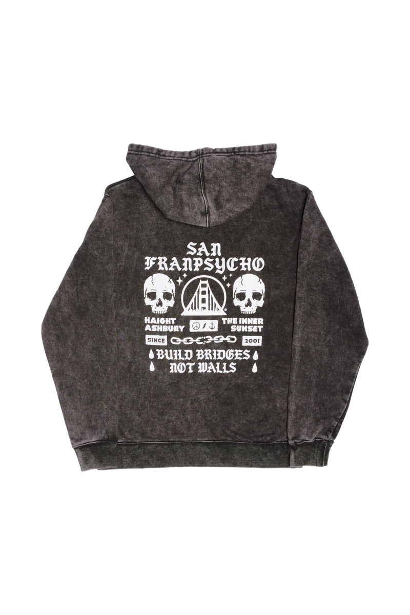 The BBNW Skull Pullover Hoodie in gray classic fit features a striking San Franpsycho design with skulls and a bridge graphic. On the back, it boldly displays the "Build Bridges Not Walls" message, capturing the essence of Punk Rock 2023. Ideal for those who love edgy style and iconic statements.