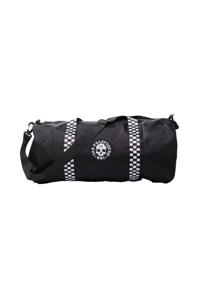 The Skull Patched Duffle Bag is made from sturdy polyester and showcases checkered straps along with a skull logo on the side. It also comes with a removable shoulder strap, allowing for versatile carrying options.