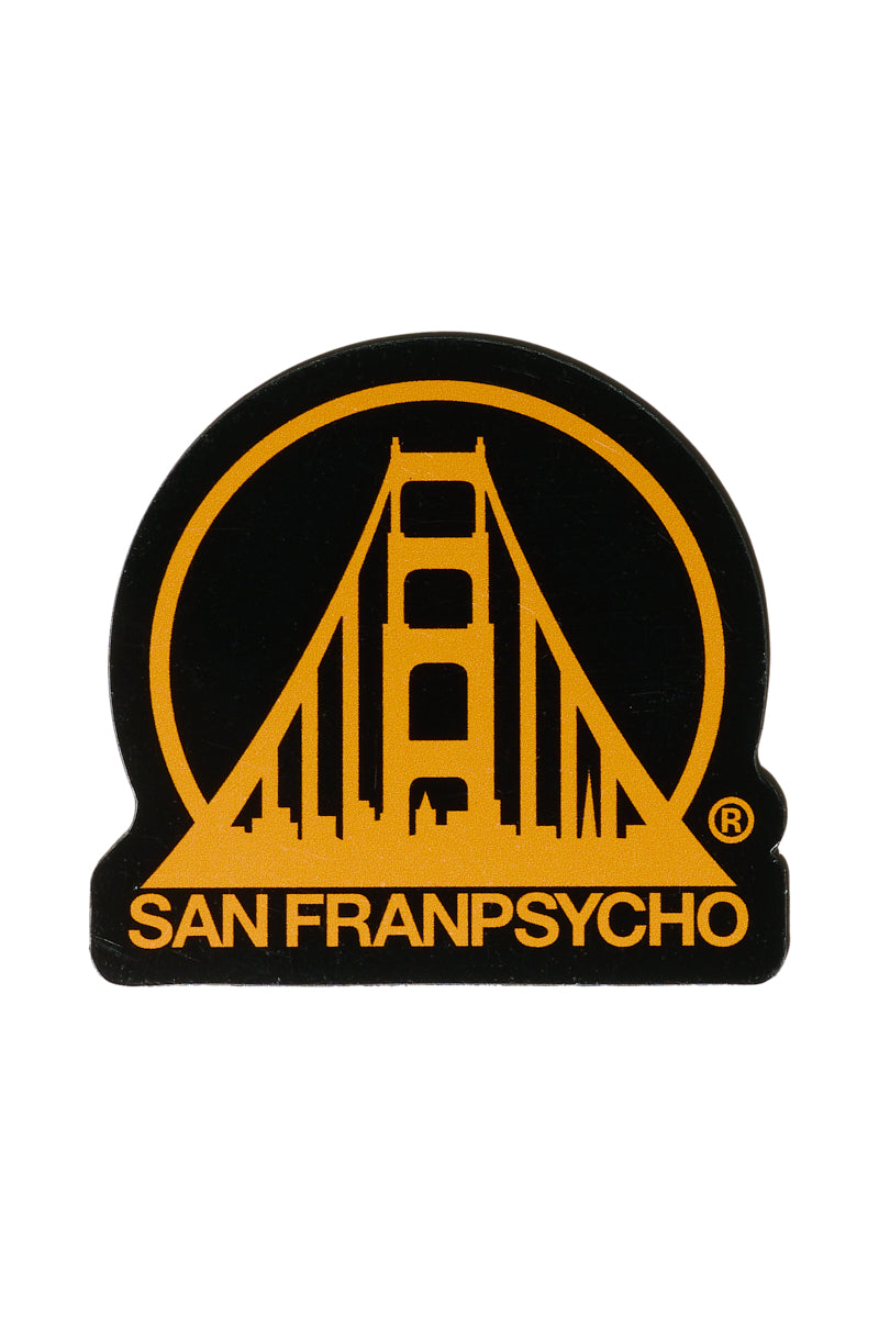 The SFP Logo Magnet displays a distinctive logo with an orange silhouette of the Golden Gate Bridge and the San Franpsycho text underneath, set against a black background for a timeless appeal.