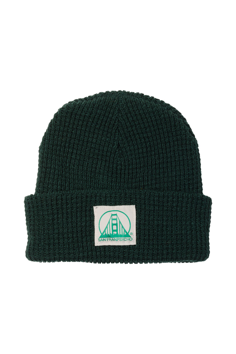 Forest Green Waffle Beanie w/ Natural/Green Logo showcasing a patch with a green bridge illustration, San Francisco text, and classic San Franpsycho style.
