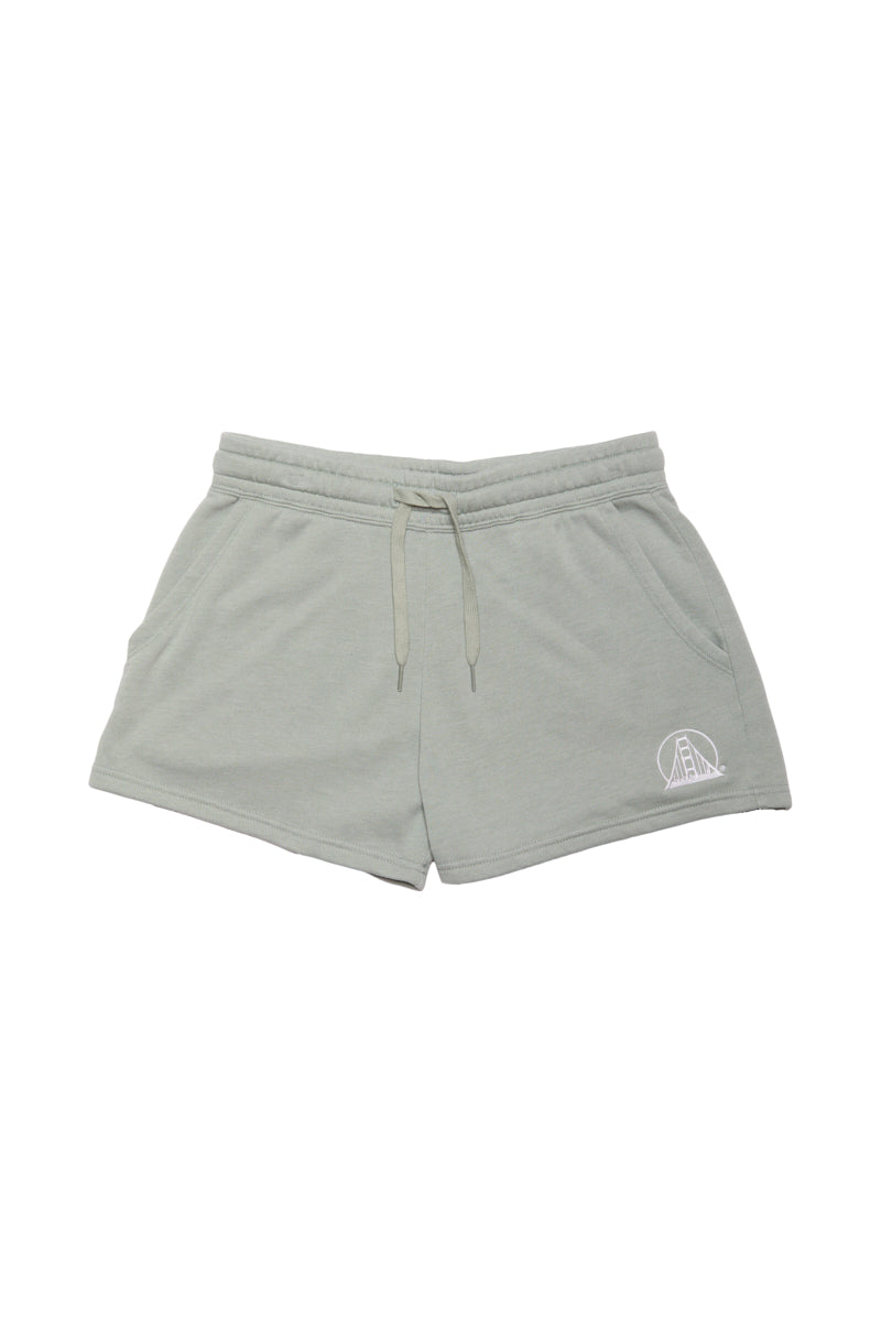 The Women's Embroidered Logo Jogger Shorts are light gray and have a drawstring waistband with a small white embroidered logo on the left side, made from a comfortable cotton/polyester blend.