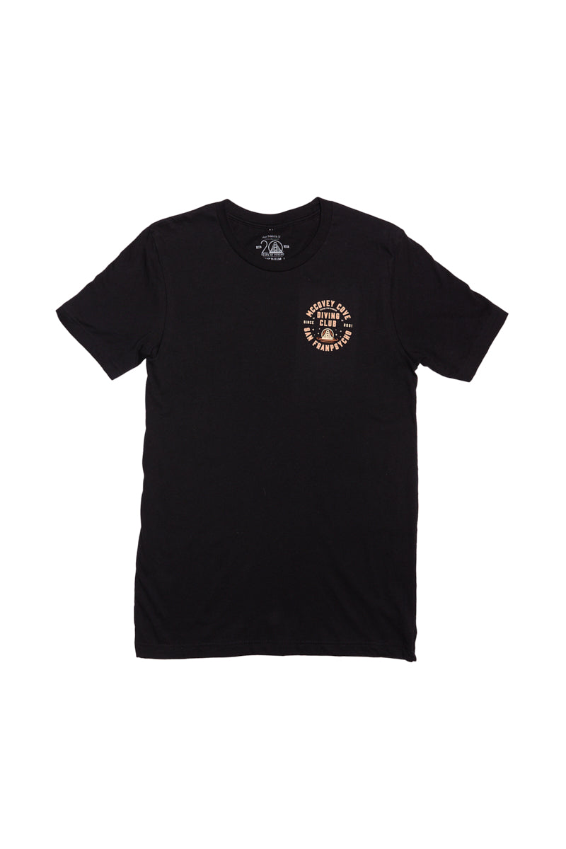 The McCovey Cove Diving Club Tee is a black T-shirt with a small circular logo and "McCovey Cove Diving Club" text on the chest, crafted from 100% cotton for ultimate comfort.