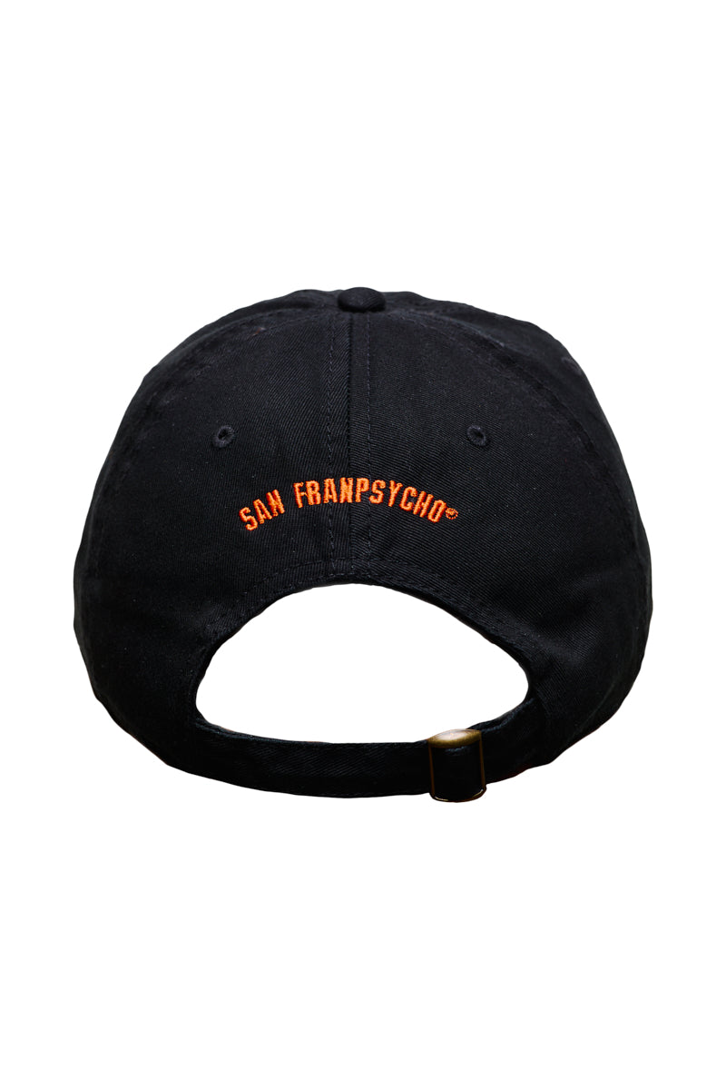 Psychos Dad Hat in black and orange, featuring an embroidered San Franpsycho logo on the back and a chic metal buckle for adjustable fitting.