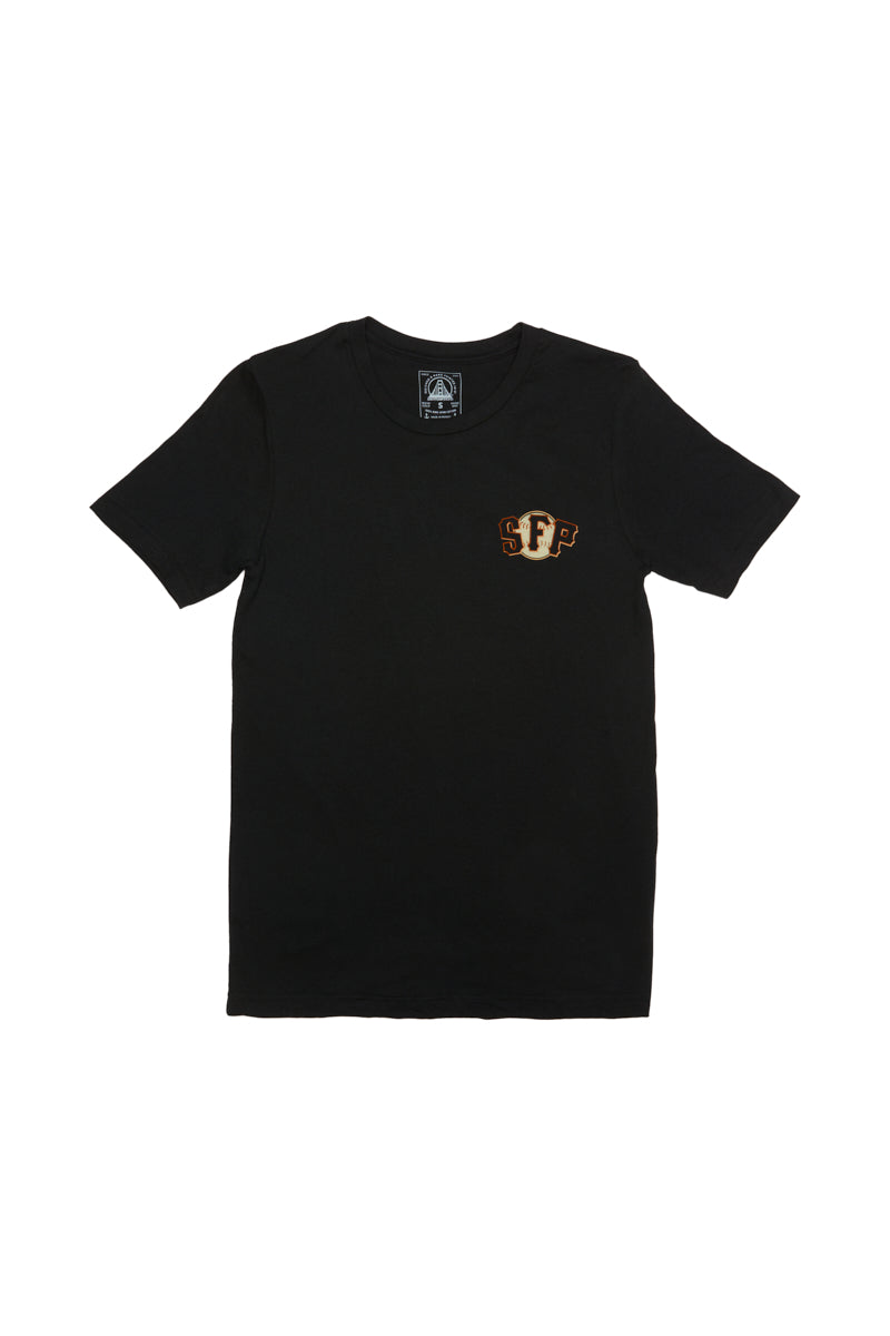 The Psychos Logo Tee is a black T-shirt featuring a small gold and orange SF logo on the front, hand printed to celebrate San Franciscos vibrant spirit and black & orange pride.