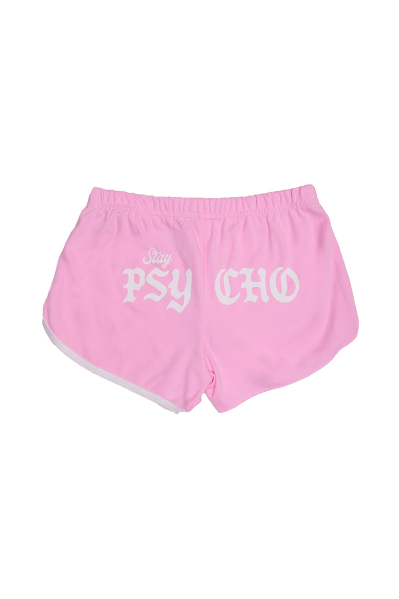 Lightweight and cozy, the Stay Psycho Booty Shorts - Pink feature light pink fabric with Stay PSYCHO in bold white Gothic font across the back.