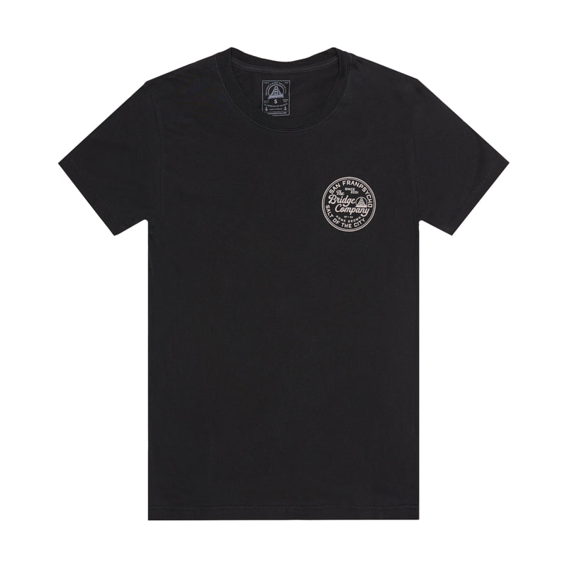 The Salt of the City Tee is a black heavyweight cotton short-sleeve shirt featuring a small white circular graphic on the left chest, hand printed in San Francisco.