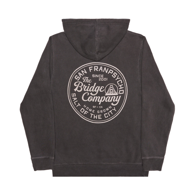 Salt of the City Pullover Hoodie: A black unisex hoodie featuring a large circular The Bridge Company graphic on the back, inspired by San Francisco—perfect for laid-back city style.