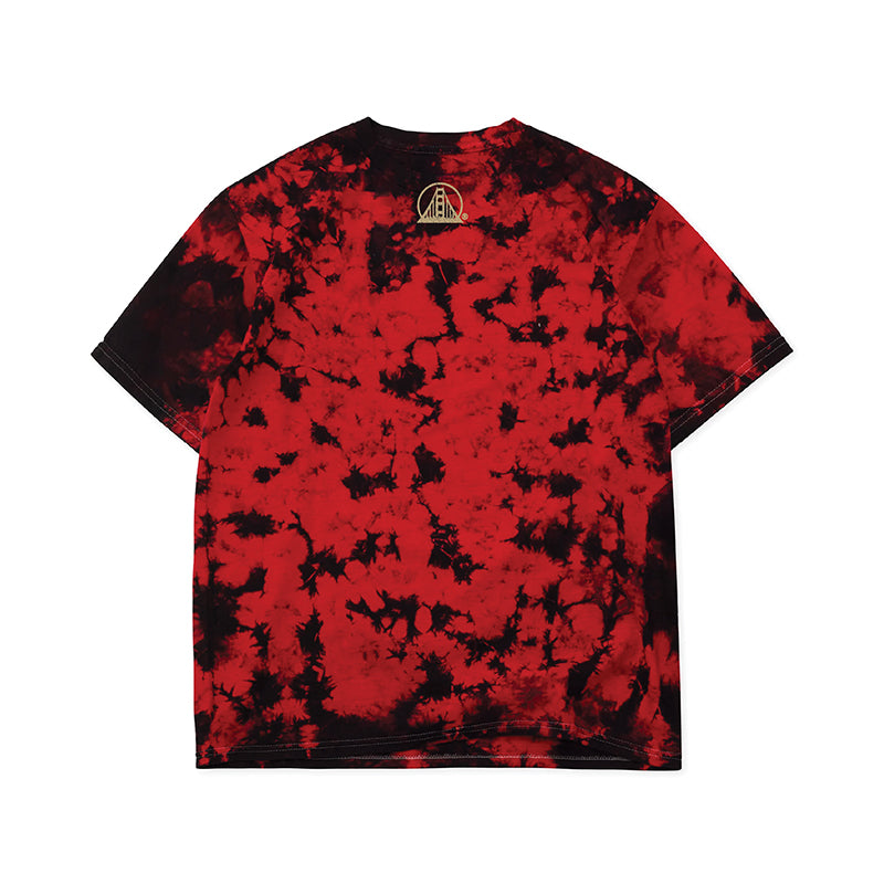 Gold Rush Tee - Red Crystal Dye: A unisex tee in red and black crystal dye, featuring a small white circular logo near the upper back neckline—perfect for any 49ers fan chasing that Gold Rush spirit.