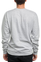 Back view of a person wearing an Inner Sunset Crewneck and black pants, embodying the relaxed vibe of a chill day in a light gray hue, set against a plain white background.