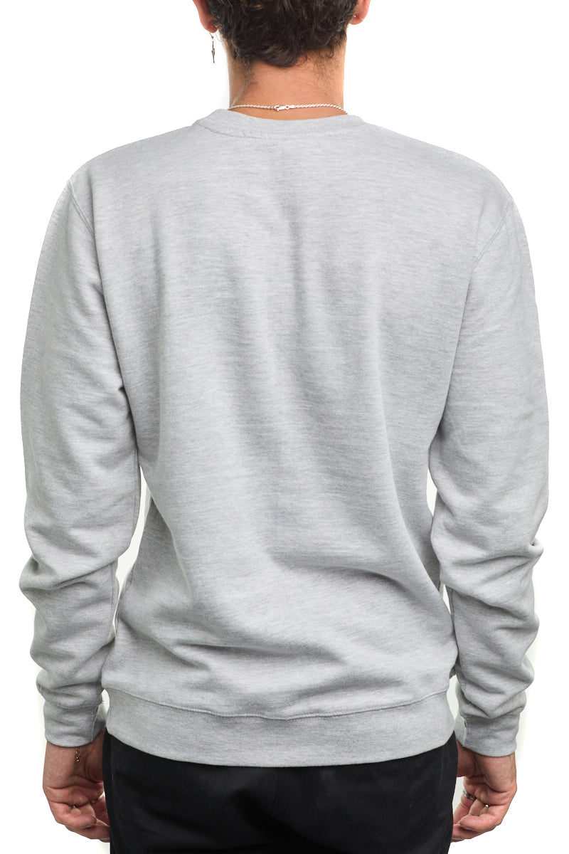 Back view of a person wearing an Inner Sunset Crewneck and black pants, embodying the relaxed vibe of a chill day in a light gray hue, set against a plain white background.