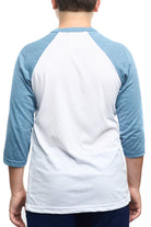A child is sporting the Youth Seal Logo Baseball Tee, which is a white and blue raglan shirt with three-quarter sleeves, viewed from the back. Made from 100% cotton, this shirt provides both comfort and style for active days.