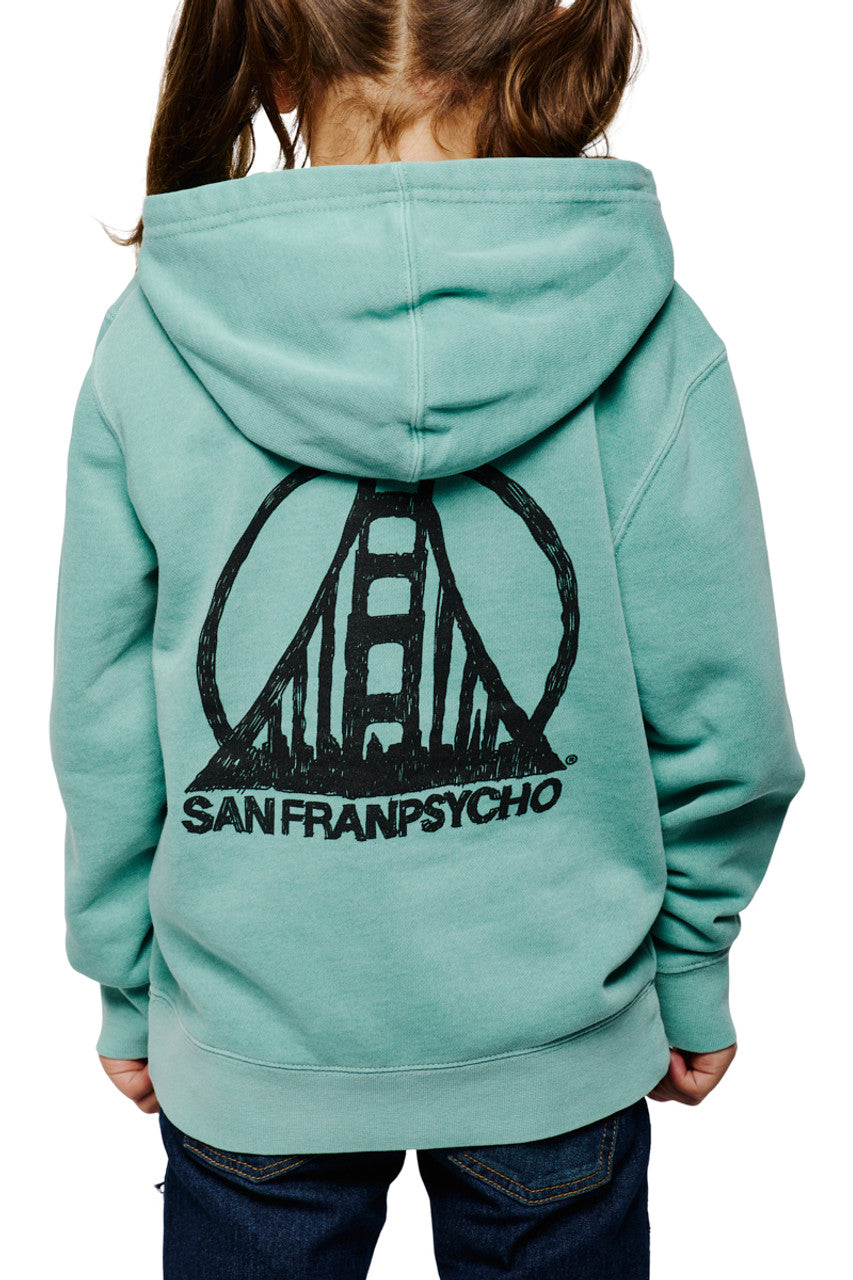 A child sports a Youth Mint Scribble Logo Pullover Hoodie, featuring the San Francisco bridge graphic and "San Franpsycho" text on the front. The back showcases the SFP scribble logo, hand printed for a unique touch.