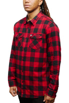 A person wearing the Red & Black Checkered SFP Flannel shirt with long sleeves, standing against a white background.