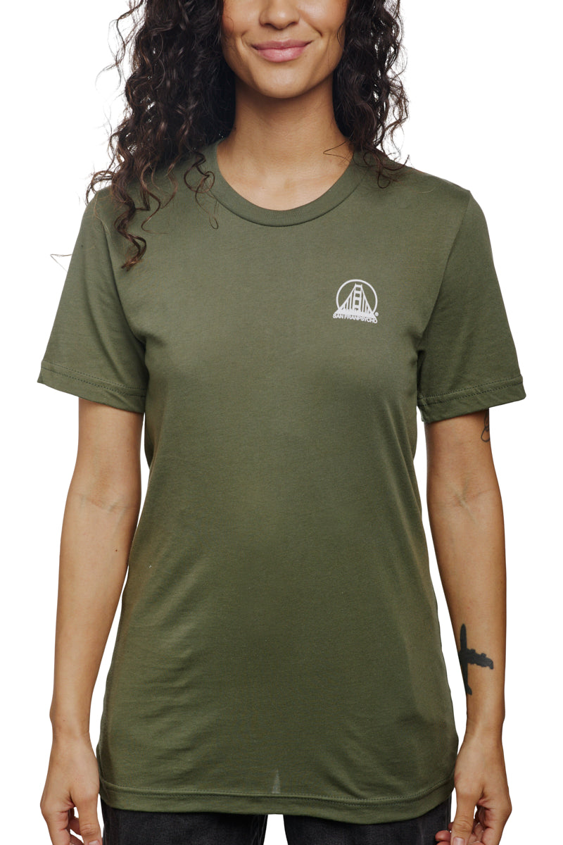 A woman with wavy hair smiling, wearing the Military Green Mini Logo Tee.