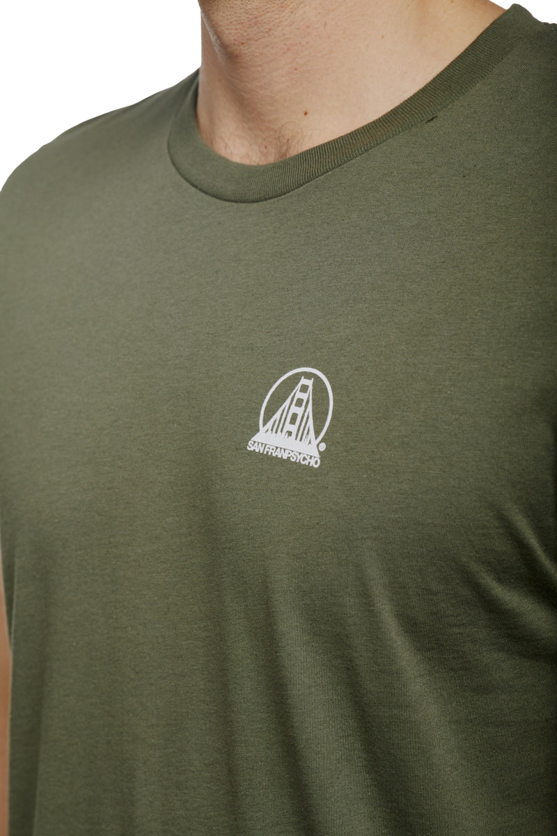 Close-up of a person wearing the Military Green Mini Logo Tee, featuring a small white San Francisco bridge mini logo from the basics line.