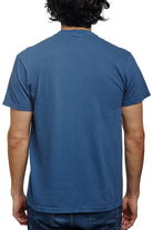 Rear view of someone wearing a Heavyweight Midnight Pocket Tee and jeans.