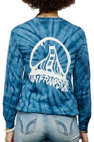A person wearing the Tie-Dye Acid Logo Long Sleeve in navy, featuring an acid logo bridge graphic and San Franpsycho text on the back.