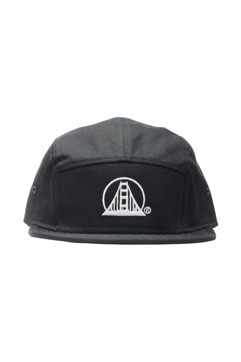 The Logo Camper Hat is a black hat featuring a white embroidered SFP logo with a stylized bridge design on the front, crafted in a one-size-fits-most style.