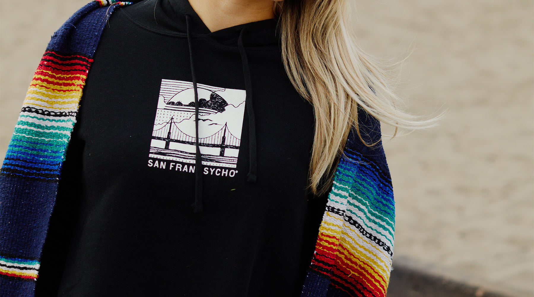 woman walking wearing the cat house women's tee