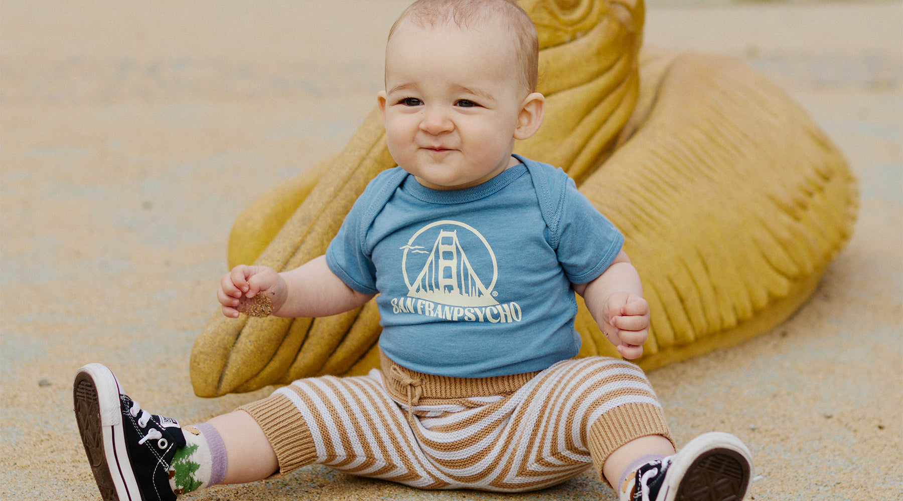 toddler wearing san franpsycho ferris plock cat stamp black onesie