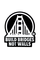 A black and white pin named "Build Bridges Not Walls Logo Pin" showcases a striking bridge illustration along with the bold message.