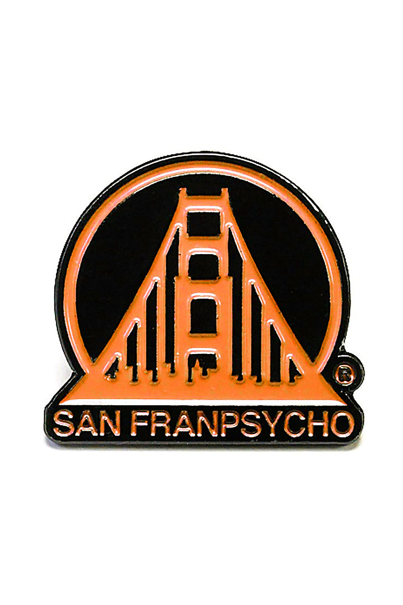 Black & Orange SFP Logo Pin showcasing a stylized Golden Gate Bridge with "San Franpsycho" text beneath.