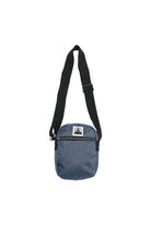 Small Sling Bag in blue with a black adjustable strap and a zippered front pocket for easy access.