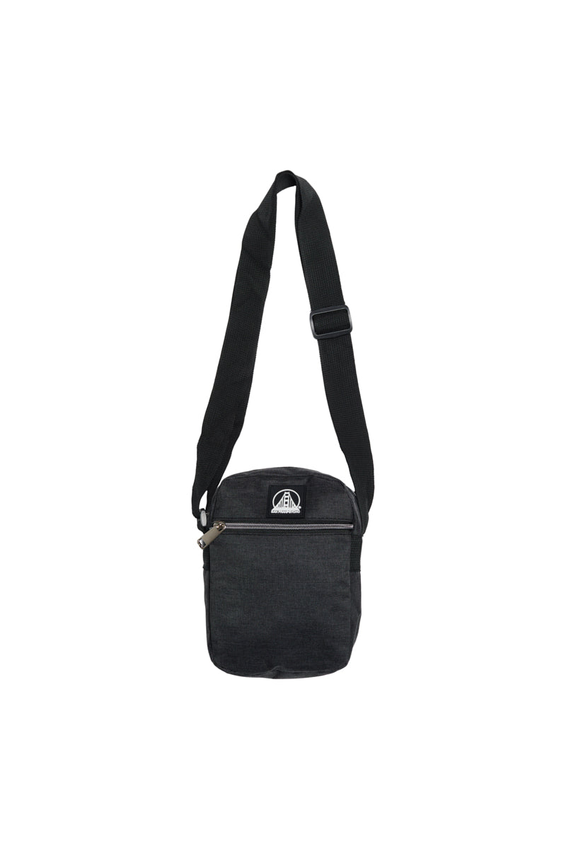 The Small Sling Bag is a stylish black crossbody with zippered pockets and an adjustable strap, combining practicality and fashion for anyone seeking a compact sling bag solution.