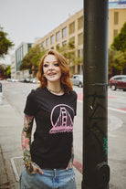 Women’s Black & Pink Logo Tee in vintage black featuring a pink graphic of the Golden Gate Bridge.