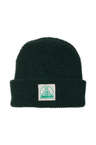 Forest Green Waffle Beanie w/ Natural/Green Logo showcasing a patch with a green bridge illustration, San Francisco text, and classic San Franpsycho style.