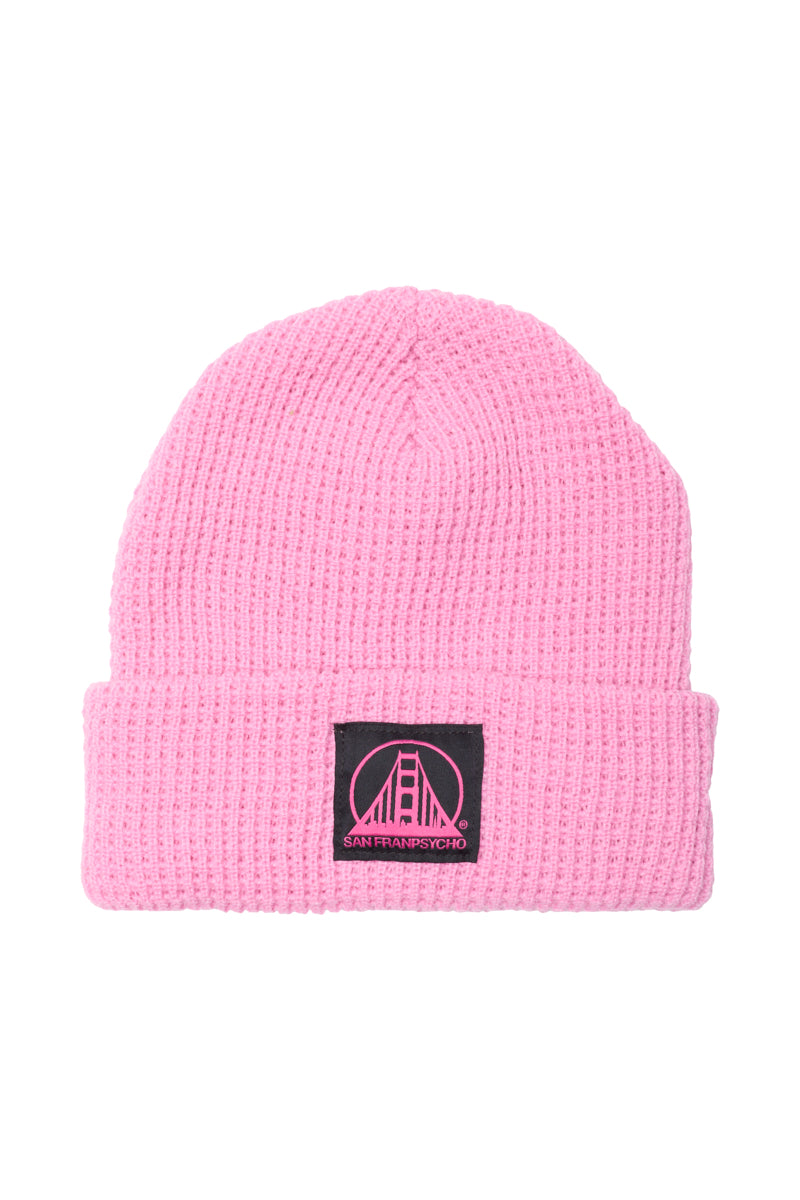Pink Waffle Beanie w/ Black/Pink Logo featuring a bridge design and San Franpsycho text, crafted from acrylic for warmth and style.