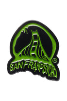 The Green Acid Logo Pin showcases a stylized bridge design with a green and black enamel finish and features the text SAN FRANPSYCHO, exuding an acid logo vibe.