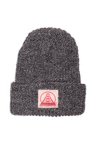 The Zebra Lumberjack Beanie features a gray knit acrylic construction with a folded brim and a patch displaying the natural/red SFP logo, making it a perfect choice for fans of the classic San Franpsycho beanie style.