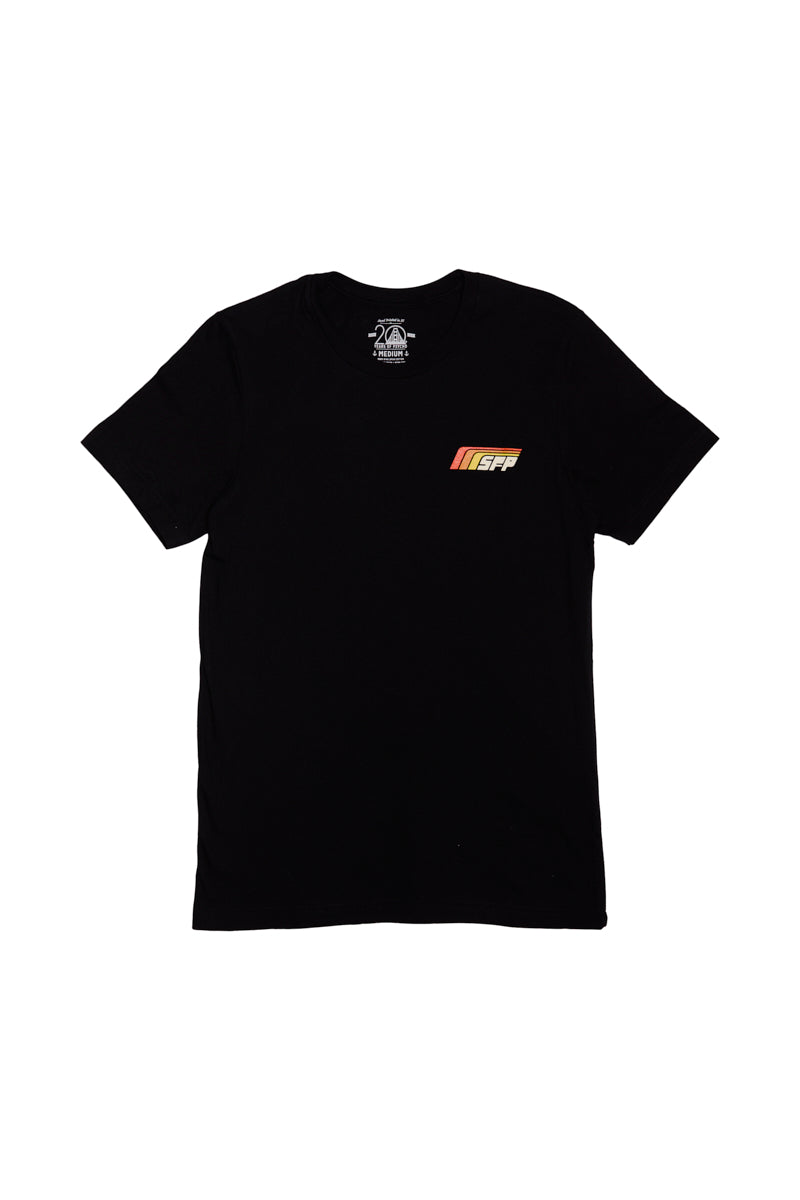 The Racing Stripes Tee in black showcases a small graphic logo on the left chest area and is crafted from 100% Airlume cotton for exceptional softness. This hand-printed T-shirt combines style with comfort, making it an ideal choice for any casual wardrobe.