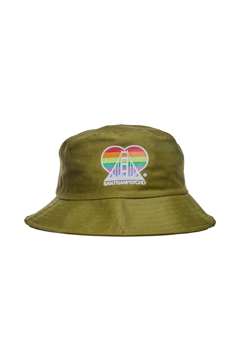 The Rainbow Logo Bucket Hat showcases an olive design adorned with a rainbow Golden Gate Bridge and San Franpsycho text, capturing the diverse spirit of the SF LGBT Center.