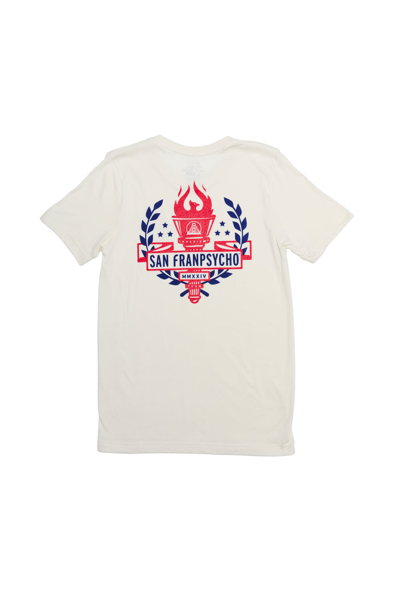 This Eternal Flame Tee, in white, features a striking red San Franpsycho graphic complete with a torch and laurel wreath. Crafted from soft Airlume cotton, it offers both style and comfort, making it ideal for the Olympic season.