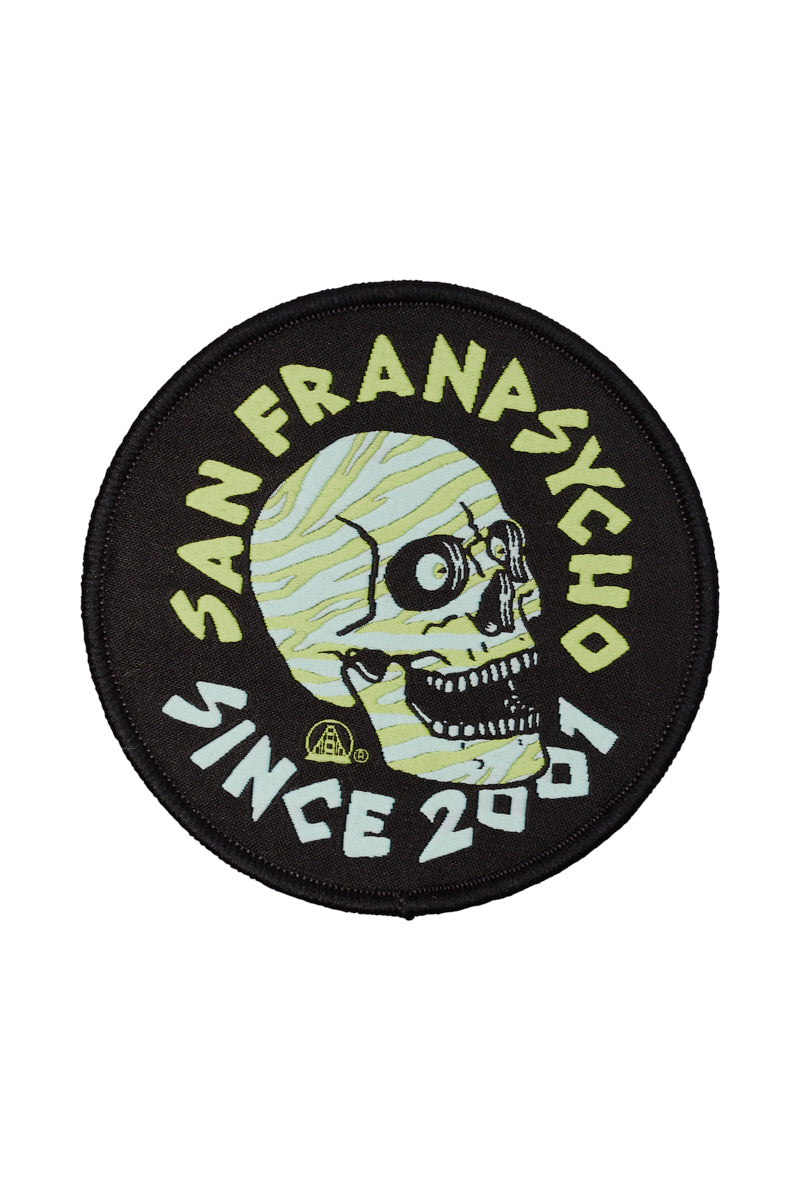 Round Zebra Skull Patch showcasing a vibrant green zebra skull logo and the phrase "San Franpsycho Since 2001" against a striking black background. Perfect for adding as an iron-on patch to customize your gear.