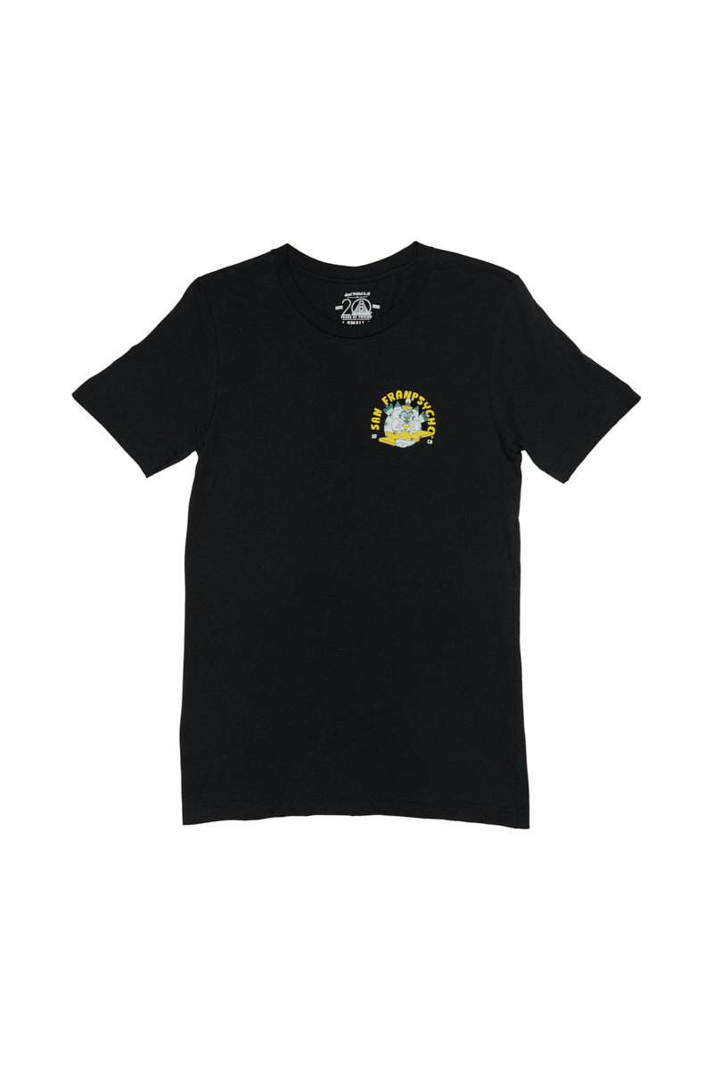The Surf Trip Tee is a unisex black T-shirt with a small graphic and yellow text on the chest, made from 100% Airlume cotton. It's ideal for capturing the surf trip vibe!