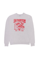 The Candlestick Champs Crewneck is a unisex sweatshirt that showcases a vintage San Francisco design featuring a football helmet, highlighting the Niners' season years and achievements in bold red.