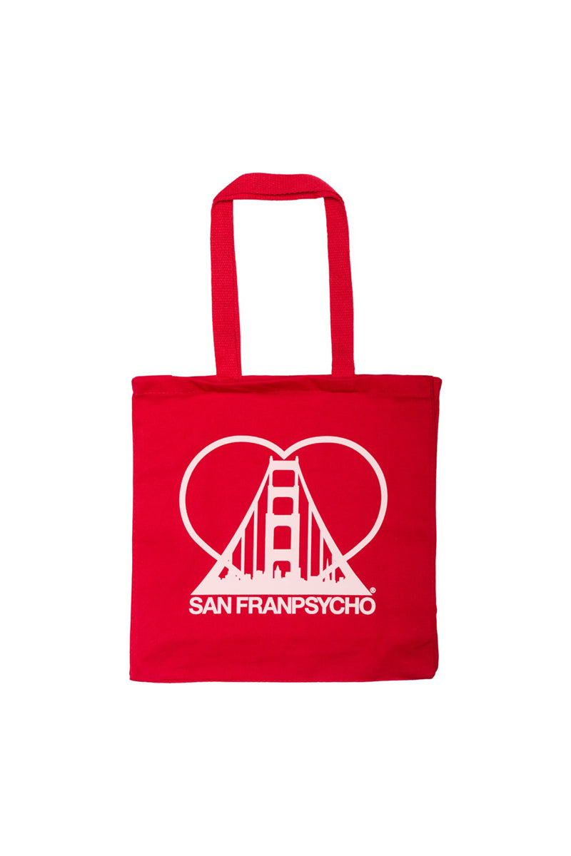The Heart Logo Tote, hand-printed with a white Golden Gate Bridge inside a red heart and labeled San Franpsycho, is made from 100% canvas for lasting durability and iconic style.