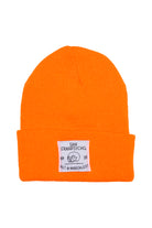 The Orange Kids Beanie w/ Wet n Wreckless Patch features bright neon orange acrylic knit and a bold white patch on the front—great for kids or anyone wanting a standout accessory.