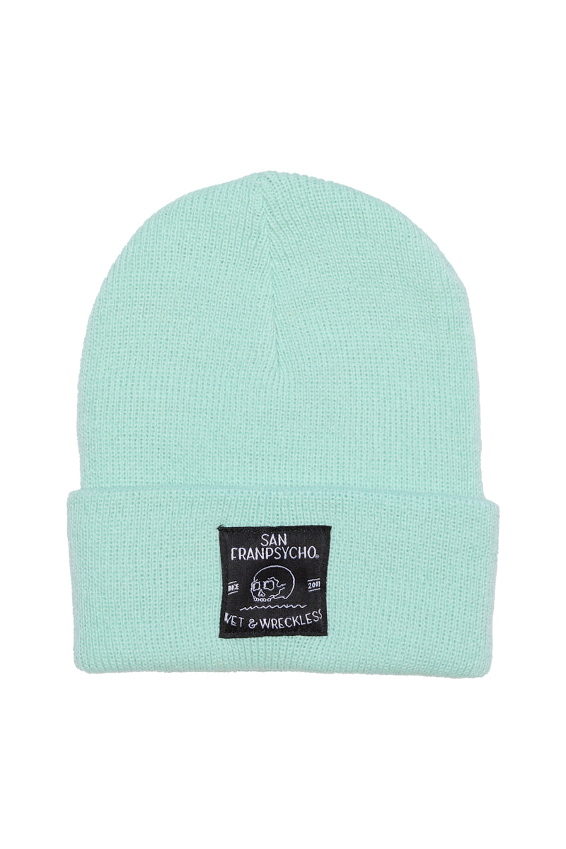 Mint knit beanie for kids featuring a black Wet n Wreckless patch on the front cuff—perfect for staying warm and stylish.