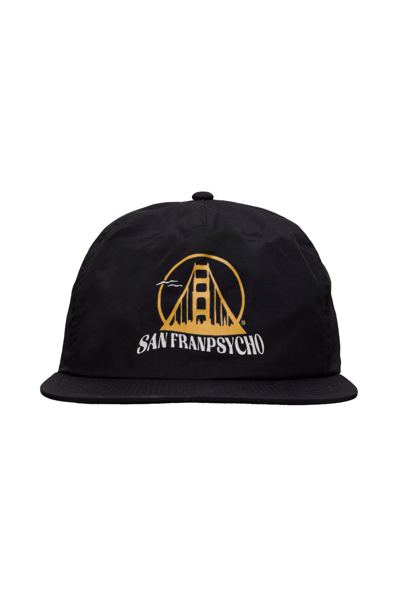 The Gull Logo Hat is a black cap featuring an embroidered yellow bridge, San Franpsycho text on the front, and a flat brim for a stylish, modern look.