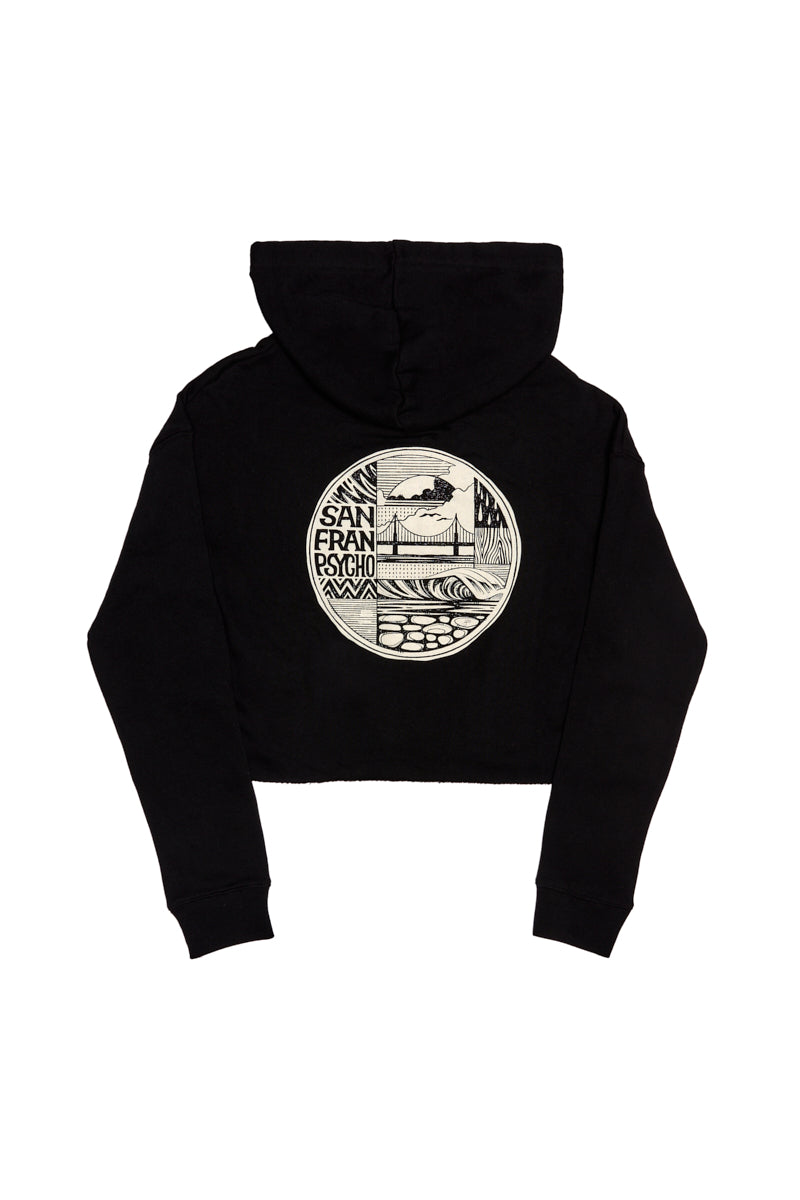 The Elemental Crop Hoodie is a black San Francisco hoodie with a round, hand-printed graphic on the back featuring waves, a sunset, and "San Fran Poscho" text.